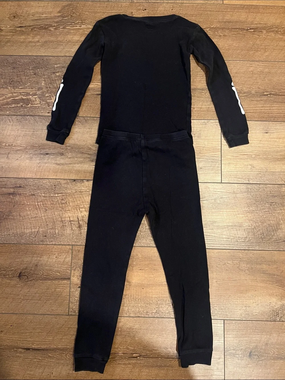 The Children’s Place “PJ Place” Halloween Skeleton Glow in the Dark Pajamas, 5T